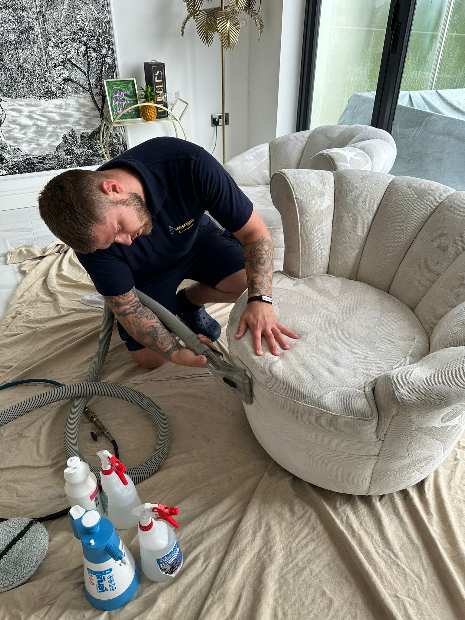 connor cleaning the armchair
